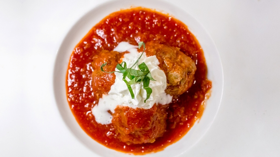 Vignone (Nonna) Meatballs, Sunday Gravy, Romano Whipped Cream, Basil
